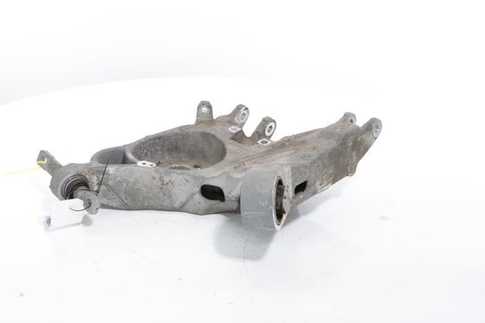 Rear wishbone, left from a Peugeot 3008 III e-3008 210 73 kWh 2024