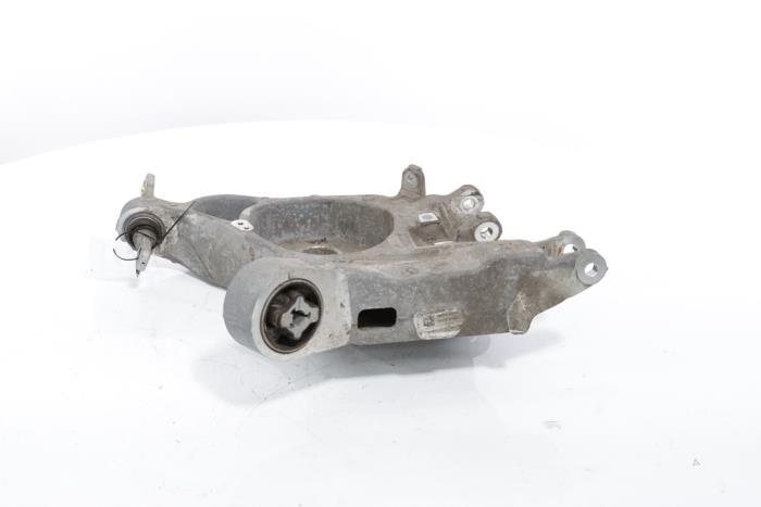 Rear wishbone, left from a Peugeot 3008 III e-3008 210 73 kWh 2024