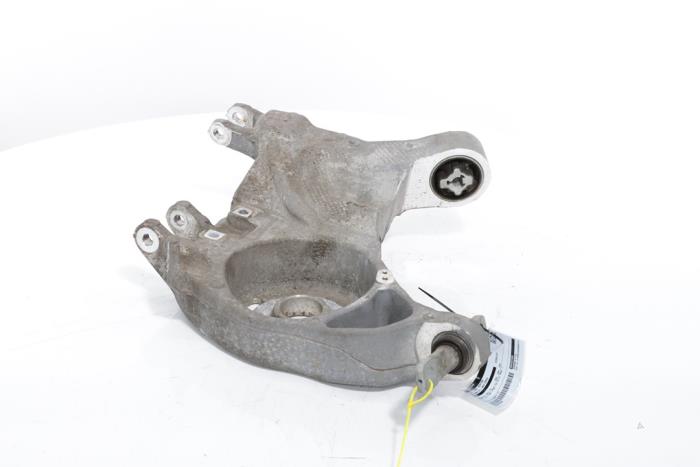 Rear wishbone, left from a Peugeot 3008 III e-3008 210 73 kWh 2024