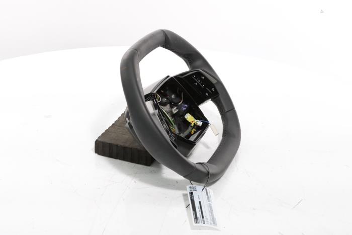 Steering wheel from a Peugeot 3008 III e-3008 210 73 kWh 2024