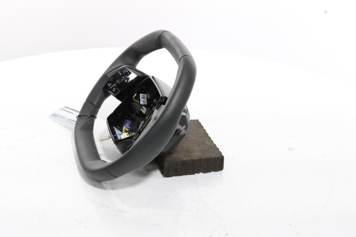 Steering wheel from a Peugeot 3008 III e-3008 210 73 kWh 2024