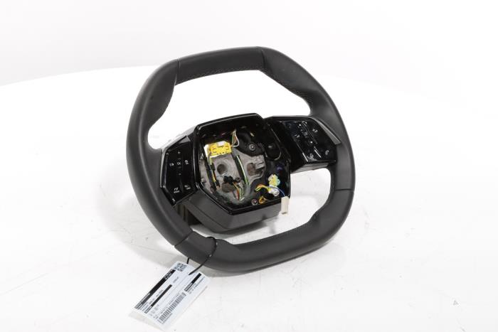 Steering wheel from a Peugeot 3008 III e-3008 210 73 kWh 2024