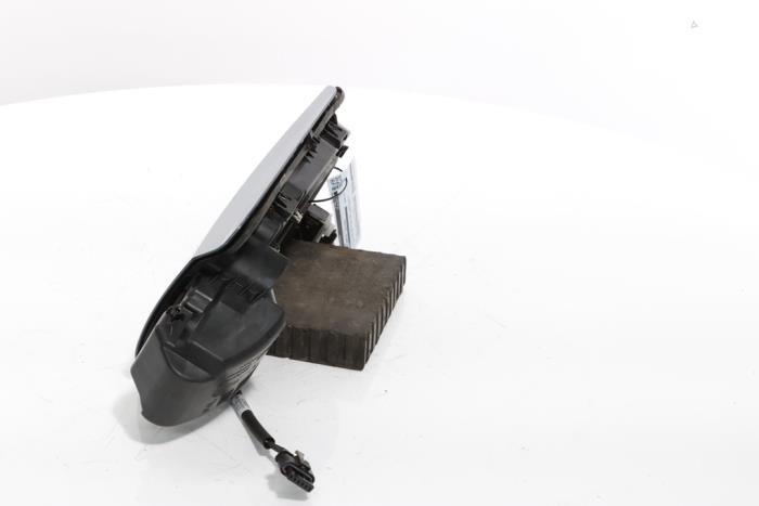 Tank cap cover from a Peugeot 3008 III e-3008 210 73 kWh 2024
