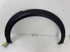 Flared wheel arch from a Peugeot 3008 III e-3008 210 73 kWh 2024