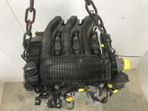 Engine from a Peugeot 208 I (CA/CC/CK/CL) 1.2 Vti 12V PureTech 82 2014