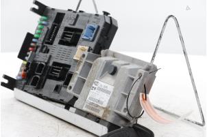 Engine management computer from a Citroën C5 III Tourer (RW) 1.8 16V 2008