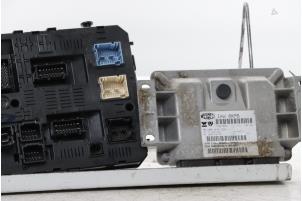 Engine management computer from a Citroën C5 III Tourer (RW) 1.8 16V 2008