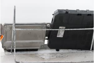 Engine management computer from a Citroën C5 III Tourer (RW) 1.8 16V 2008
