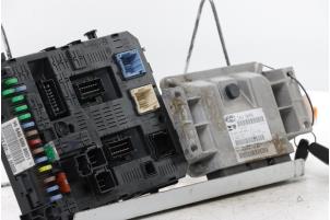 Engine management computer from a Citroën C5 III Tourer (RW) 1.8 16V 2008