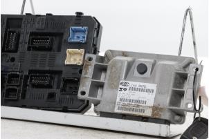 Engine management computer from a Citroën C5 III Tourer (RW) 1.8 16V 2008
