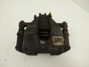 Used Front brake calliper, left Peugeot 3008 I (0U/HU) 1.6 VTI 16V Price € 26,99 Margin scheme offered by Snuverink Autodemontage