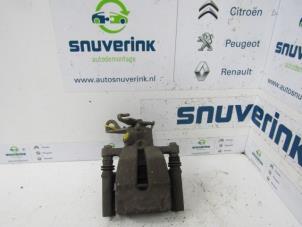 Used Rear brake calliper, left Renault Megane II Grandtour (KM) 1.5 dCi 80 Price on request offered by Snuverink Autodemontage