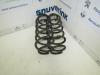 Rear coil spring from a Peugeot 107, 2005 / 2014 1.0 12V, Hatchback, Petrol, 998cc, 50kW (68pk), FWD, 384F; 1KR, 2005-06 / 2014-05, PMCFA; PMCFB; PNCFA; PNCFB 2012