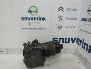 Used Oil filter housing Peugeot 307 Break (3E) 1.6 HDiF 110 16V Price € 46,00 Margin scheme offered by Snuverink Autodemontage