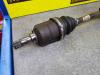 Drive shaft, rear right from a Opel Corsa C (F08/68) 1.4 16V 2002