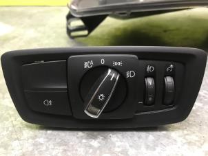 Usados Interruptor de luz BMW 1 serie (F20) M140i 3.0 24V Precio € 102,85 IVA incluido ofrecido por de Nollen autorecycling