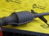 Catalytic converter from a Mazda 323F 1999