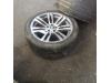 Wheel + tyre from a BMW X5 (E70) xDrive 35d 3.0 24V 2013