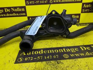 Used Thermostat housing Mini Mini (R56) 1.6 16V Cooper S Price € 60,00 Margin scheme offered by de Nollen autorecycling