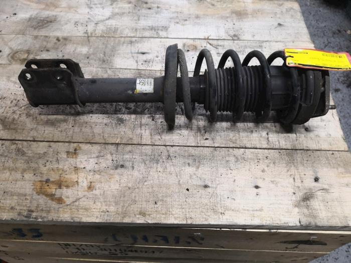 Front shock absorber rod, left from a Opel Corsa B (73/78/79) 1.2i 16V 2000