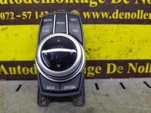 Używane Przycisk I-Drive BMW 1 serie (F21) 118i 1.5 TwinPower 12V Cena € 151,25 Z VAT oferowane przez de Nollen autorecycling