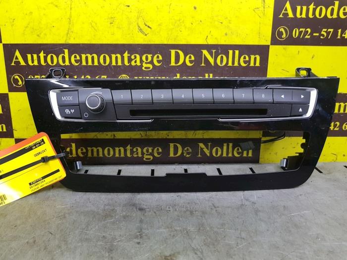 Używane Panel climatronic BMW 1 serie (F20) 118i 1.5 TwinPower 12V Cena € 125,84 Z VAT oferowane przez autodemontage denollen