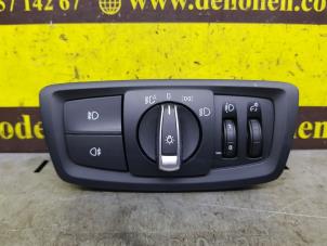 Usados Interruptor de luz BMW 1 serie (F20) 118i 1.5 TwinPower 12V Precio € 90,75 IVA incluido ofrecido por de Nollen autorecycling