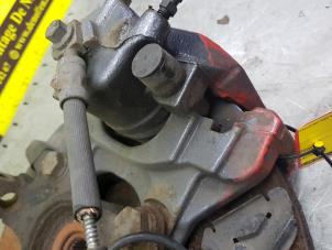 Used Front brake calliper, right Opel Corsa D 1.6i OPC 16V Turbo Ecotec Price on request offered by de Nollen autorecycling