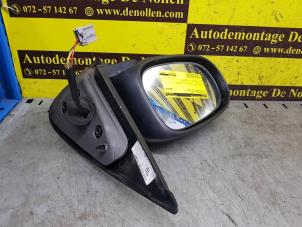 Used Wing mirror, left Nissan Almera (N16) 1.8 16V Price € 35,00 Margin scheme offered by de Nollen autorecycling
