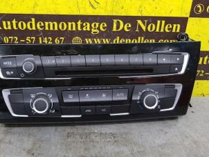 Usados Panel de control de calefacción BMW 1 serie (F20) 116d 1.5 12V TwinPower Precio € 150,00 Norma de margen ofrecido por de Nollen autorecycling