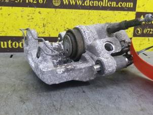 Used Rear brake calliper, left Ford C-Max (DXA) 1.0 Ti-VCT EcoBoost 12V 100 Price € 90,75 Inclusive VAT offered by de Nollen autorecycling