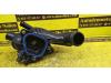 Thermostat housing from a MINI Mini (R56) 1.4 16V One 2009