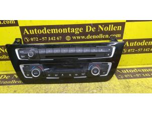 Usados Panel de control de calefacción BMW 1 serie (F20) M140i 3.0 24V Van Precio € 151,25 IVA incluido ofrecido por de Nollen autorecycling