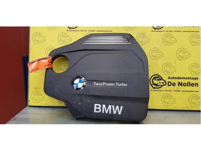 Engine cover from a BMW 1 serie (F20) 120d TwinPower Turbo 2.0 16V Van 2018