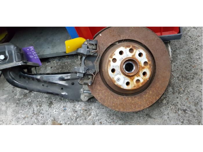 Rear brake calliper, left from a Volkswagen Golf VII Variant (AUVV) 2.0 R 4Motion 16V 2017