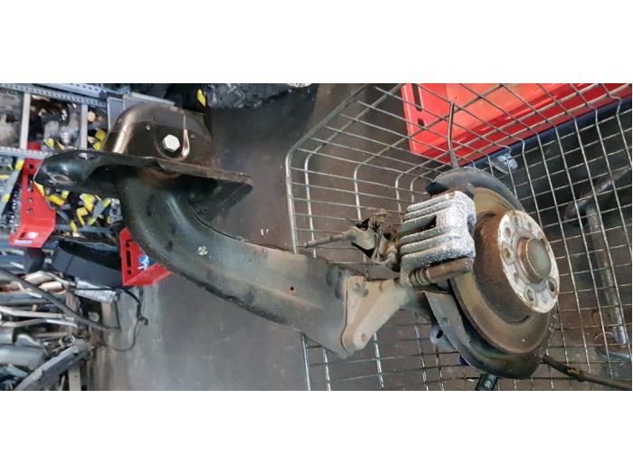 Rear brake calliper, left from a Volkswagen Scirocco (137/13AD) 1.4 TSI BlueMotion Technology 125 16V 2015