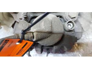 Used Front brake calliper, left BMW 3 serie (E90) 318i 16V Price € 40,00 Margin scheme offered by de Nollen autorecycling