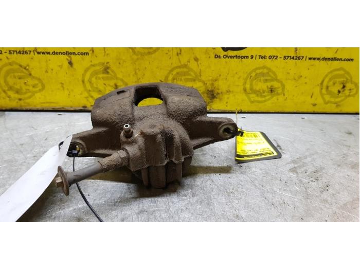 Front brake calliper, left from a Peugeot 307 (3A/C/D) 2.0 HDi 90 2002