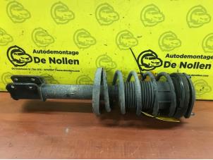 Used Fronts shock absorber, left Opel Corsa B (73/78/79) 1.2i 16V Price € 40,00 Margin scheme offered by de Nollen autorecycling