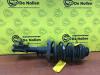 Fronts shock absorber, left from a Opel Adam, 2012 / 2019 1.2, Hatchback, 2-dr, Petrol, 1.229cc, 51kW (69pk), FWD, A12XER, 2012-10 / 2019-02 2014