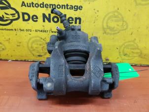 Used Front brake calliper, left Renault Twingo III (AH) 1.0 SCe 70 12V Price on request offered by de Nollen autorecycling