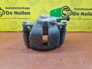 Used Front brake calliper, left Mini Mini (R56) 1.6 One D 16V Price € 50,00 Margin scheme offered by de Nollen autorecycling