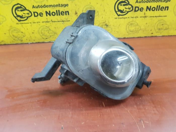 Fog light, front right from a Opel Corsa D 1.4 16V Twinport 2007