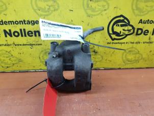 Used Rear brake calliper, left BMW 3 serie Compact (E46/5) 316ti 16V Price € 30,00 Margin scheme offered by de Nollen autorecycling