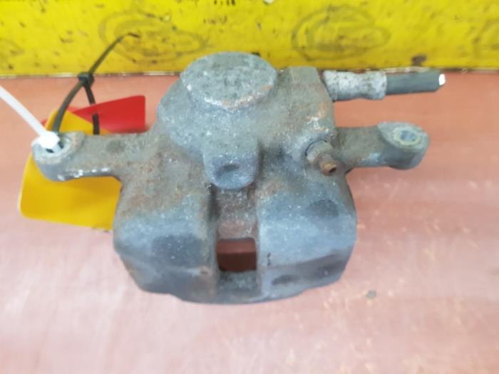 Front brake calliper, left from a MINI Mini Open (R57)  2014