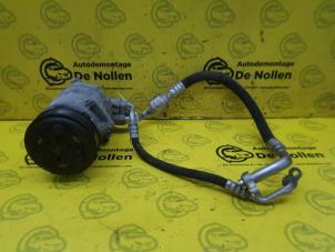 Usagé Compresseur de clim Opel Insignia Sports Tourer 2.0 Turbo 16V Bio-Ethanol E85 Prix sur demande proposé par de Nollen autorecycling