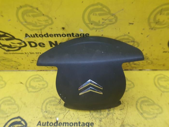 Left airbag (steering wheel) from a Citroën C5 III Berline (RD) 2.2 HDiF 16V 163 DPFS 2008
