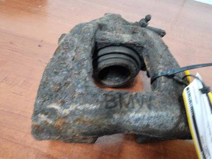 Front brake calliper, left from a MINI Mini Cooper S (R53) 1.6 16V 2005