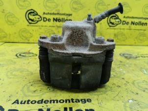 Used Front brake calliper, left Dacia Sandero I (BS) 1.5 dCi 70 Price € 50,00 Margin scheme offered by de Nollen autorecycling