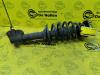 Front shock absorber rod, right from a Daihatsu Sirion/Storia (M1), Hatchback, 1998 / 2005 2003